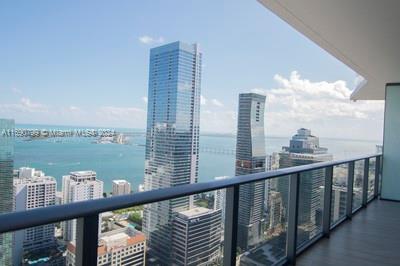 a view of a balcony next to a lake view