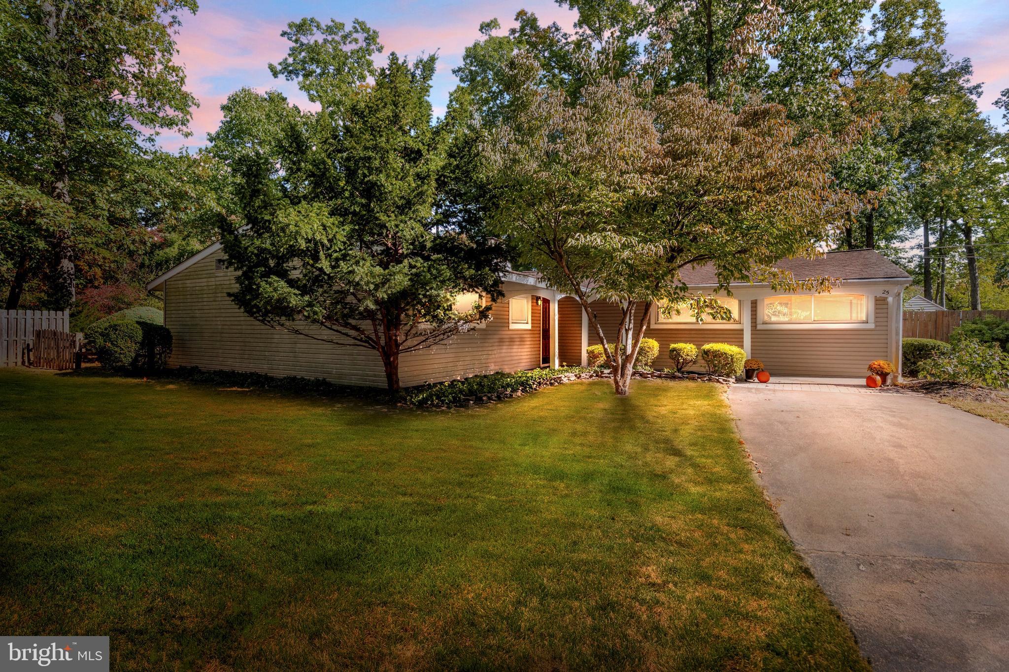 a house view with a garden space