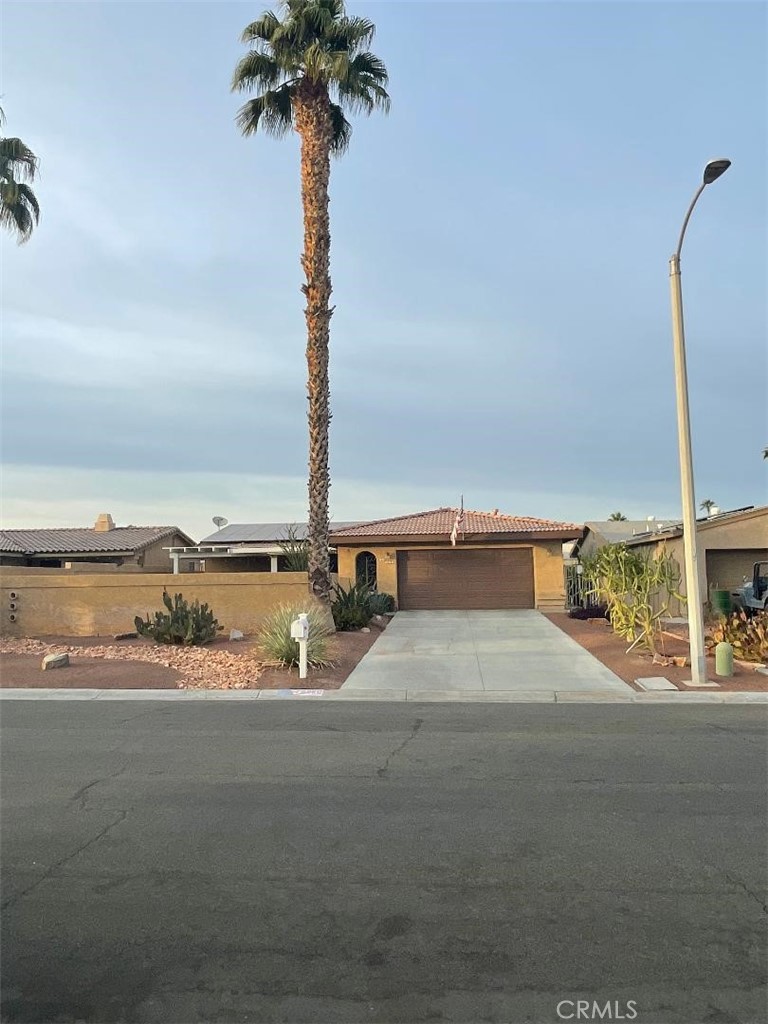 a view of a street with an ocean view