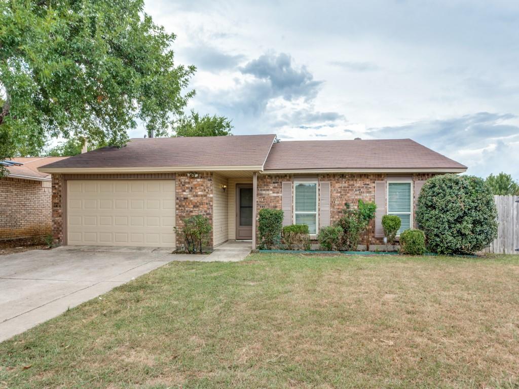 front view of a house and a yard