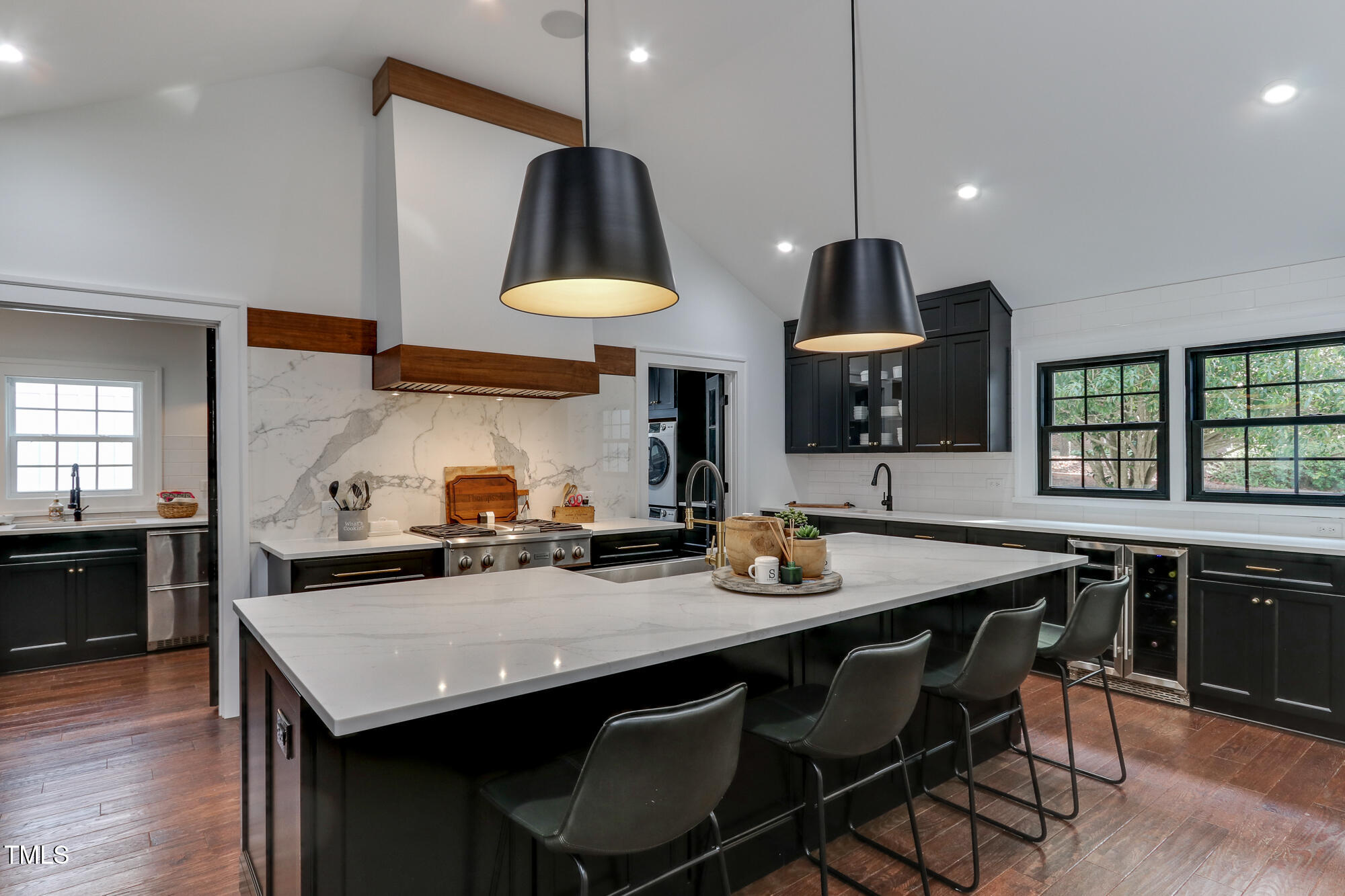 a kitchen with a table and chairs in it