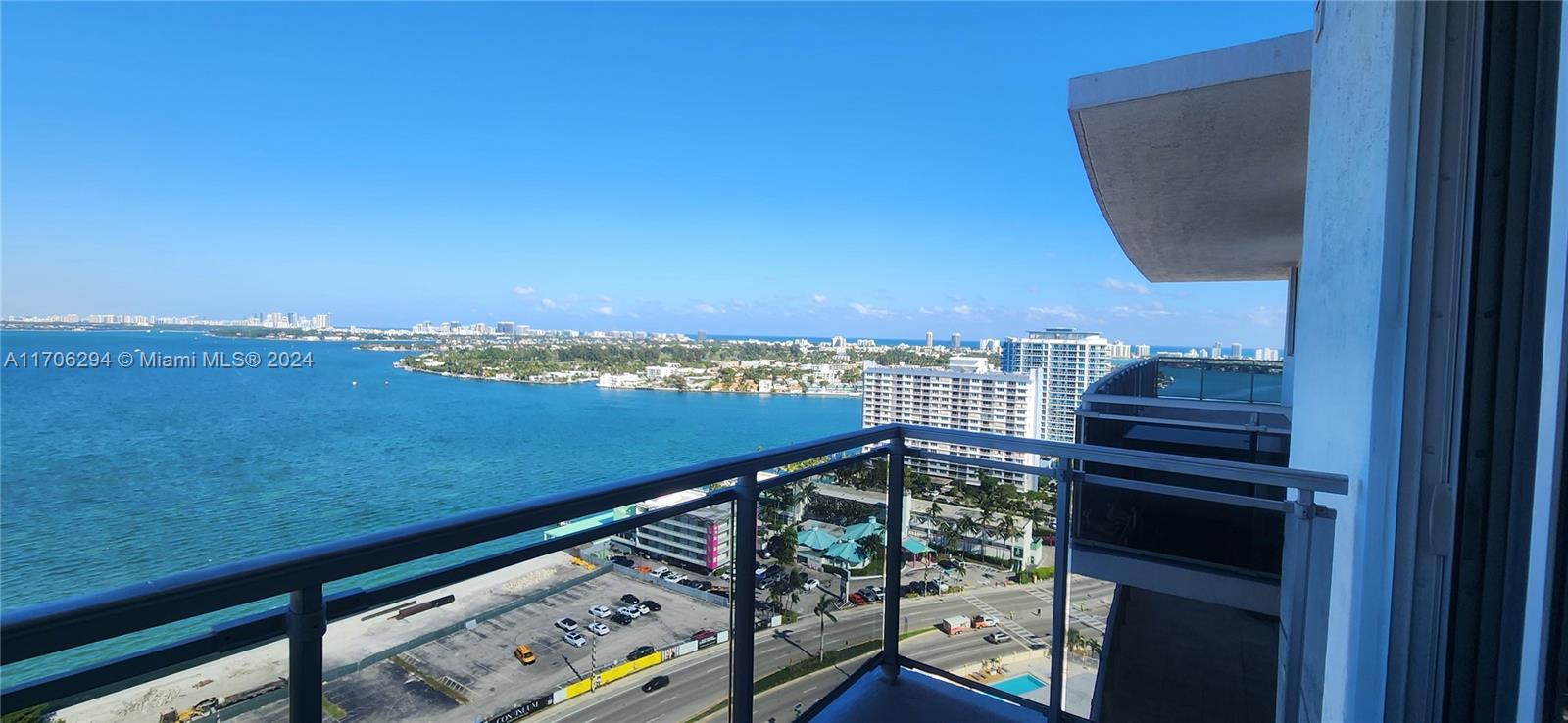 a view of a balcony with an ocean view