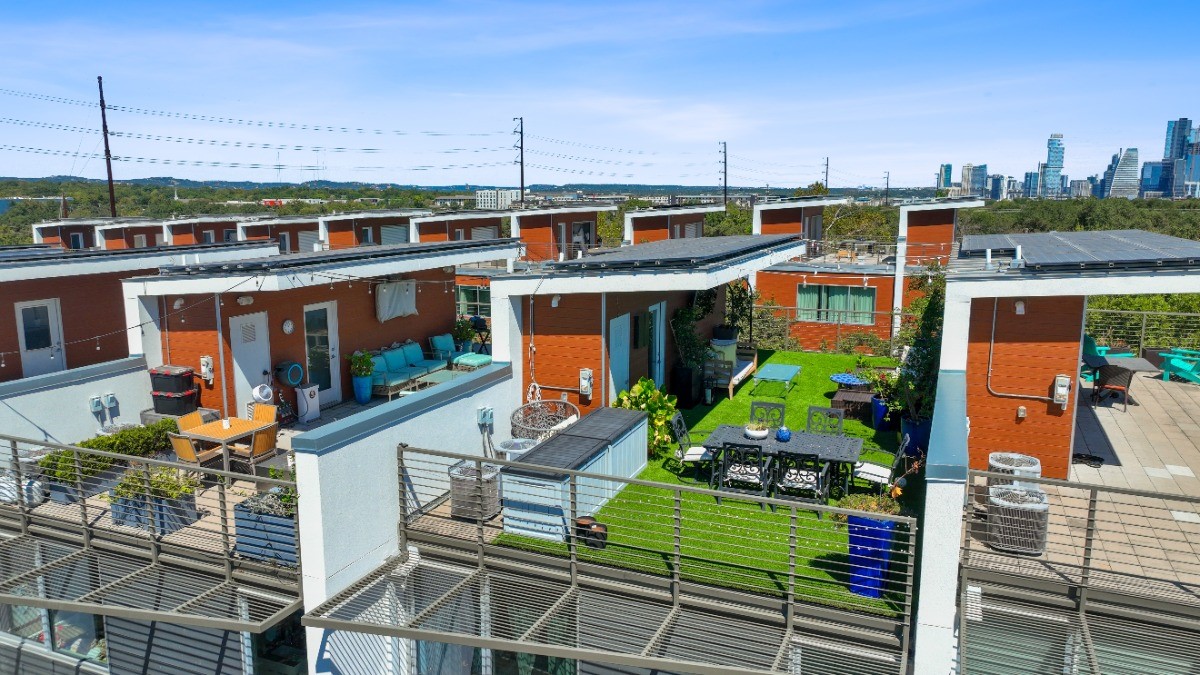 an aerial view of a house with garden