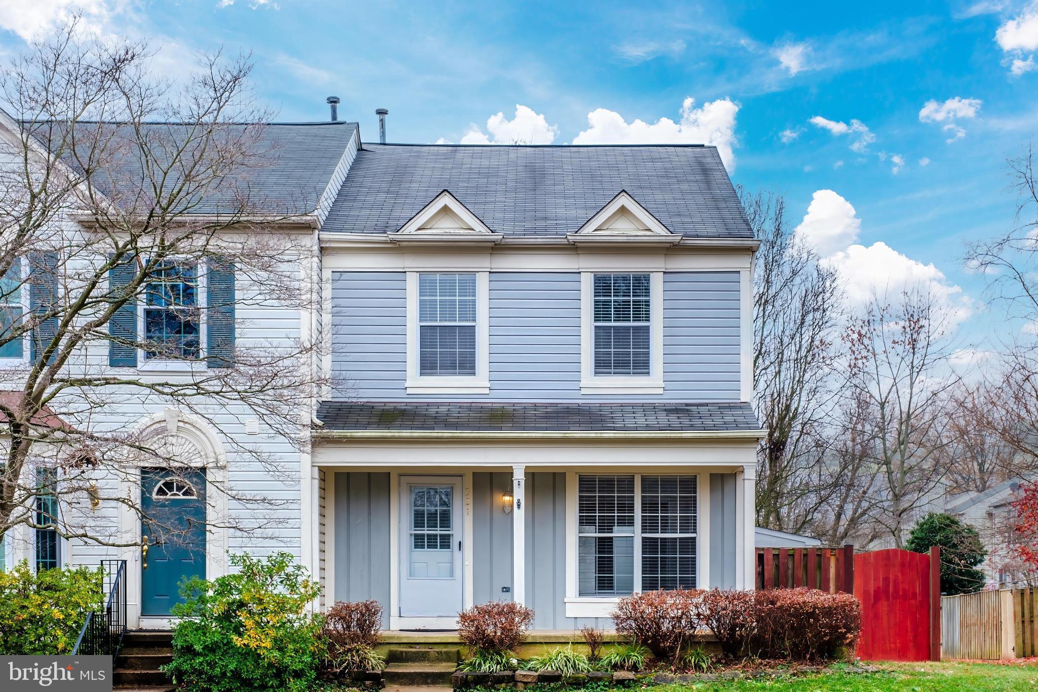 a front view of a house with yard