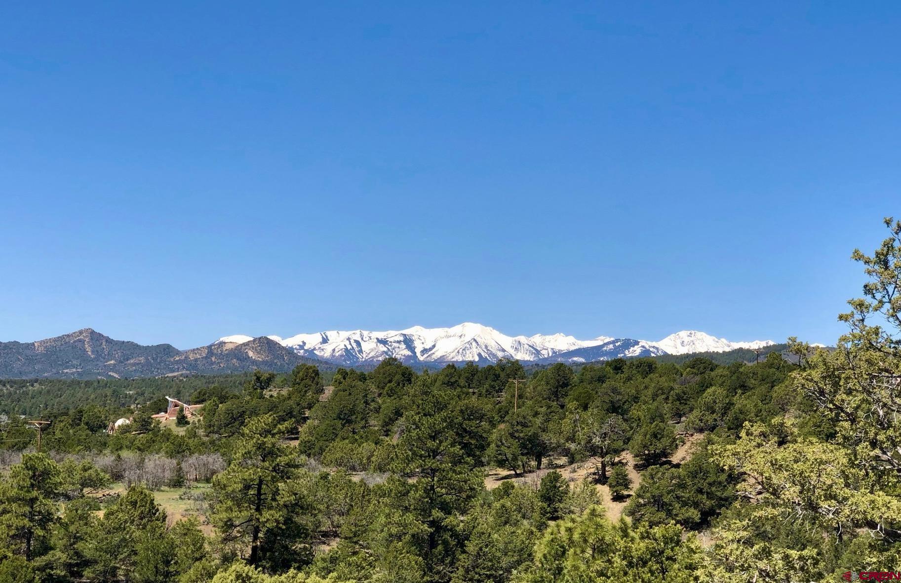 a view of a city with a mountain