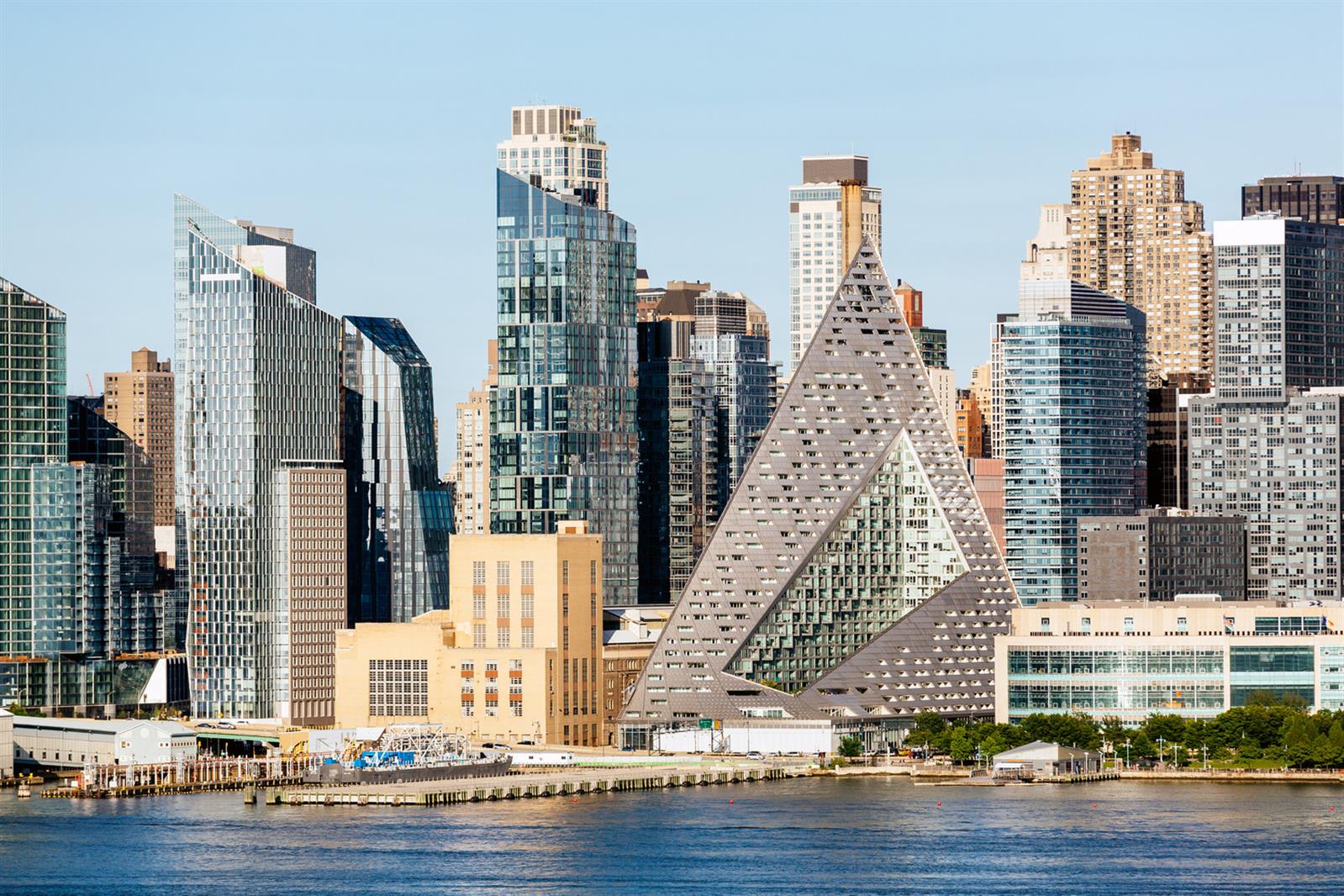 a view of city with tall buildings