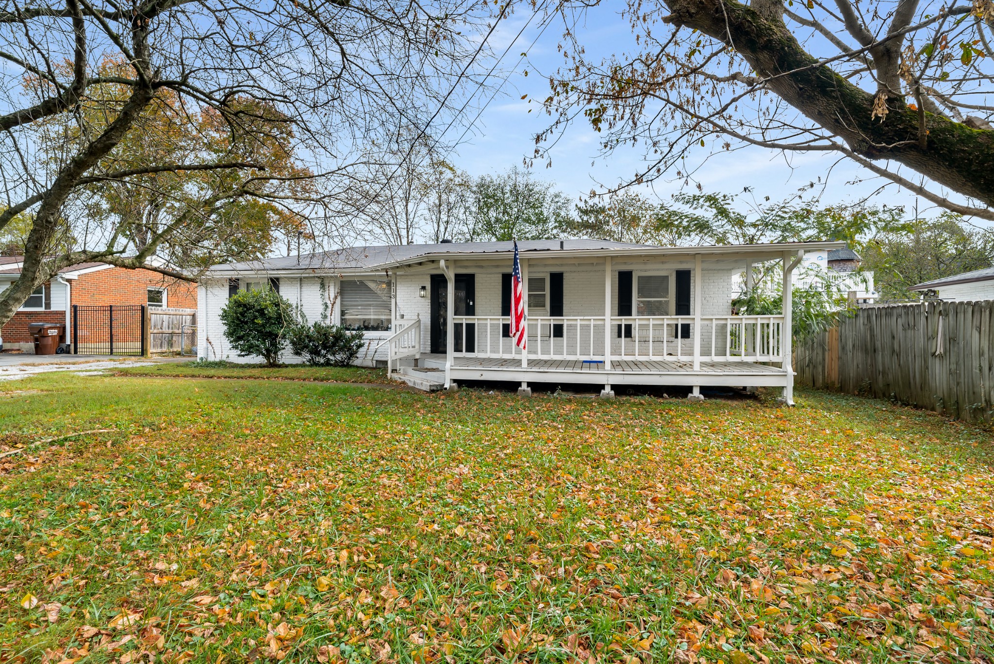 a front view of house with yard and seating area