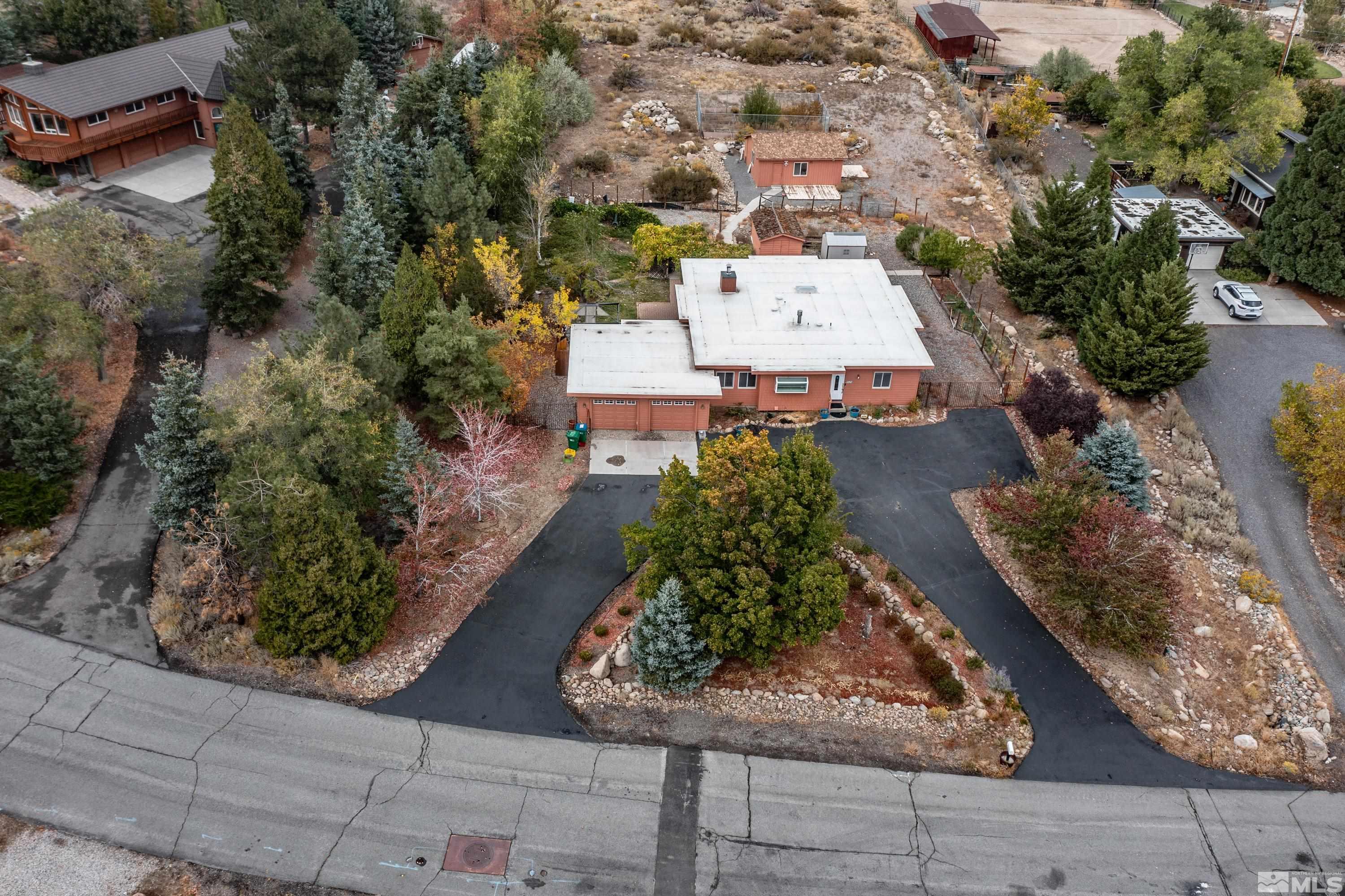 an aerial view of a house with garden