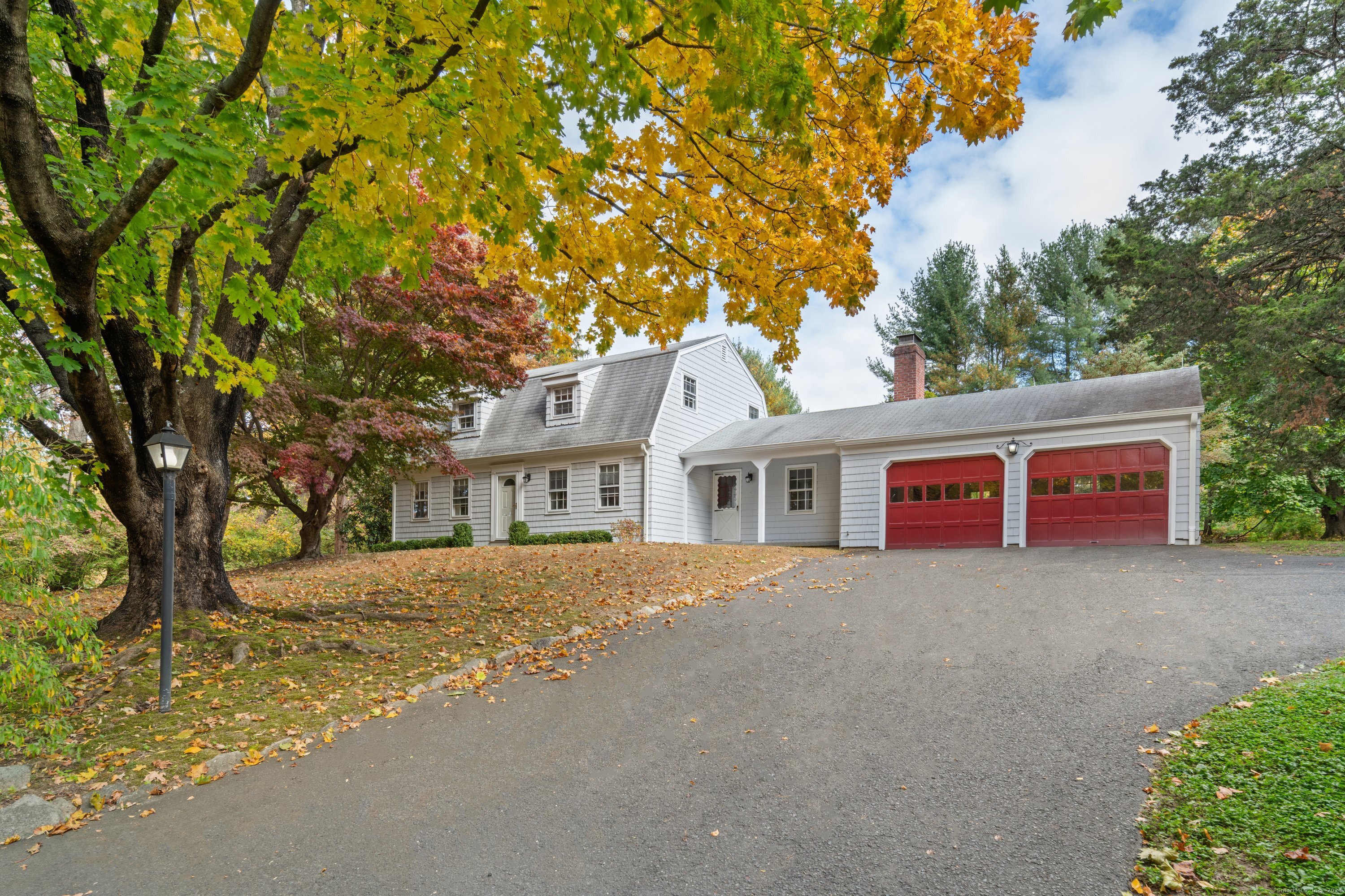 a front view of a house with yard