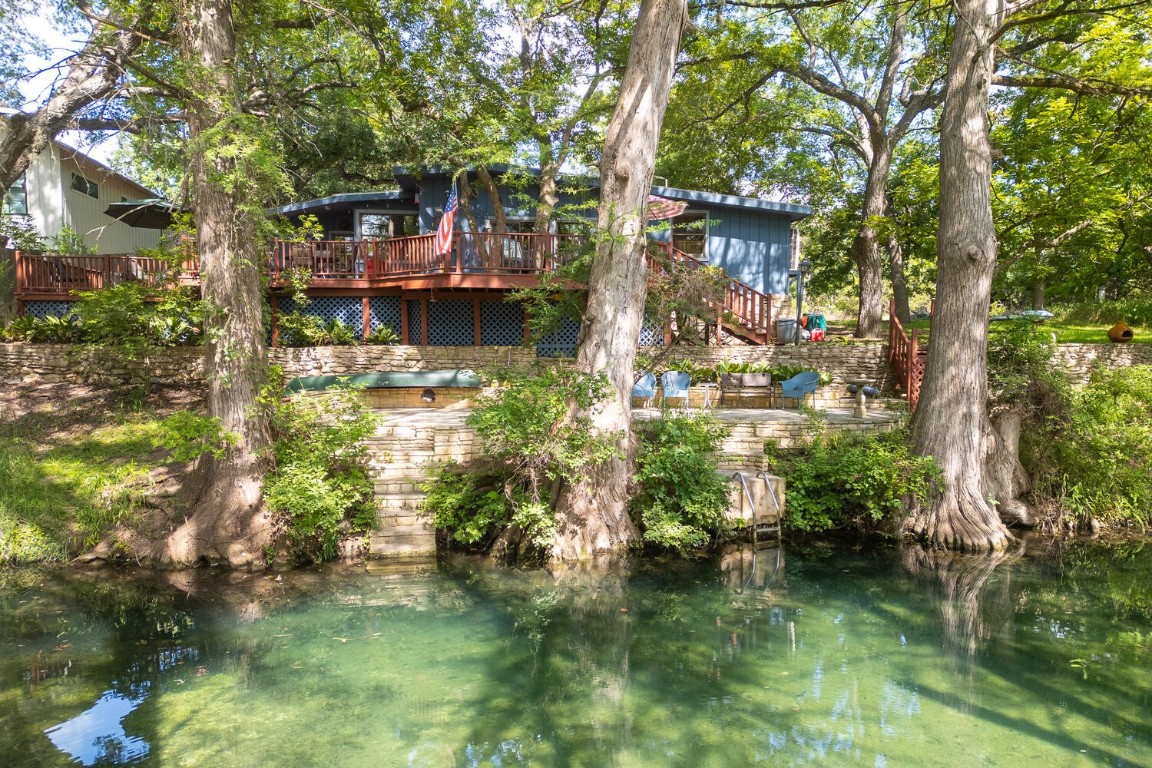 a backyard of a house with lots of green space