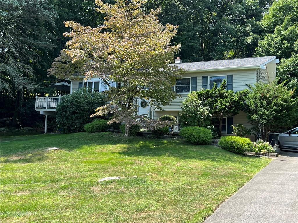 View of front of property featuring a front lawn