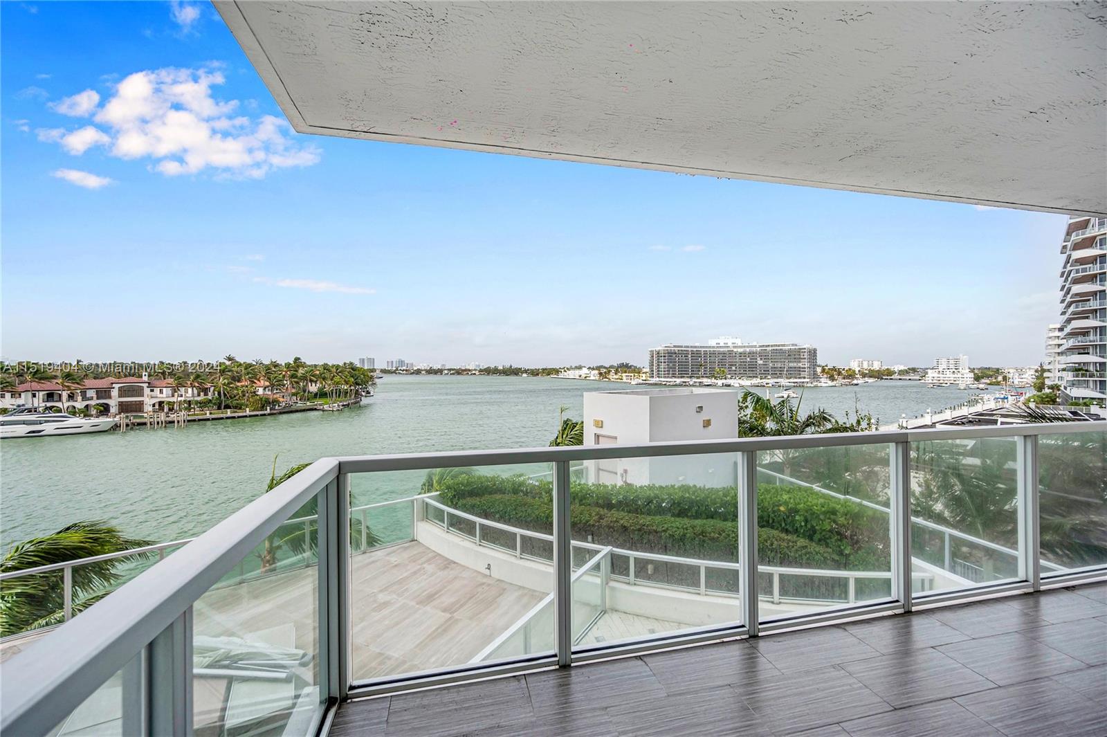 a view of a balcony with an ocean view