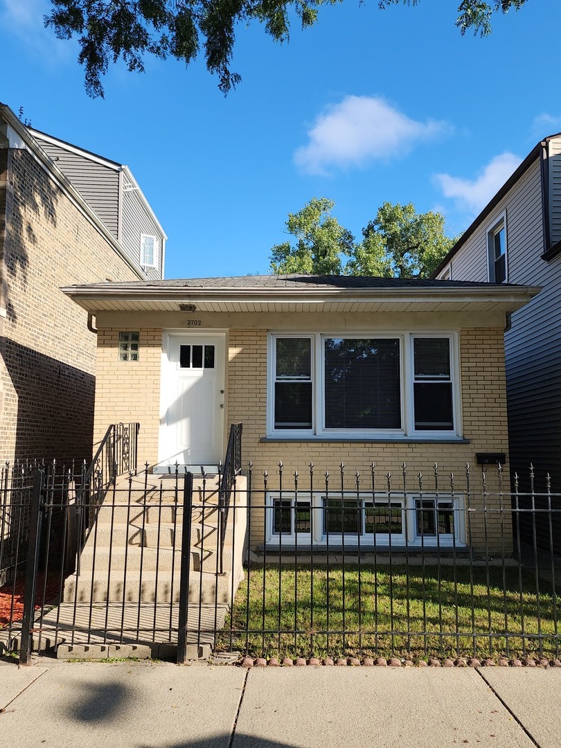 a front view of a house with a balcony