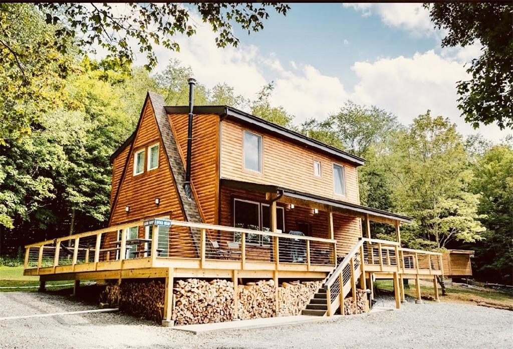 a front view of a house with a ocean view