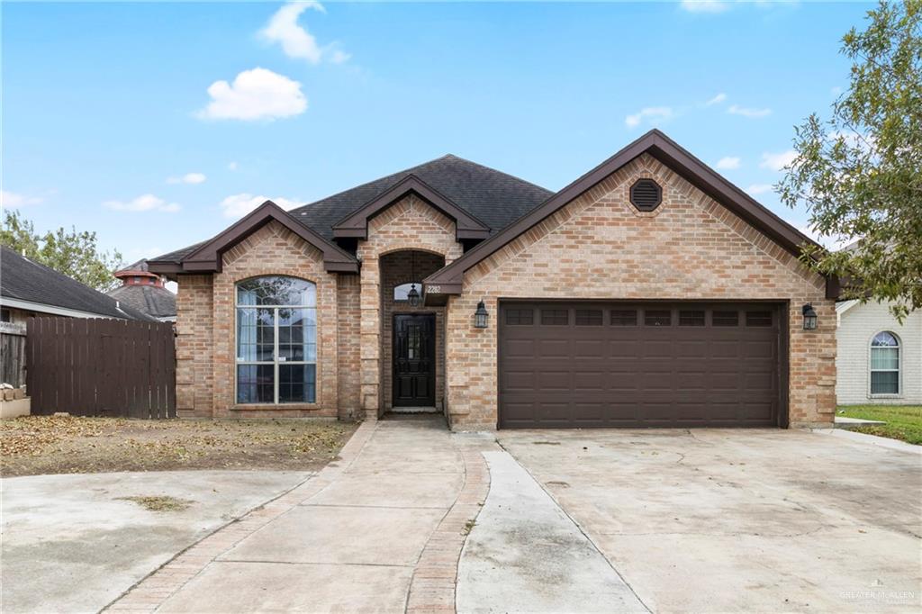 French country style house with a garage