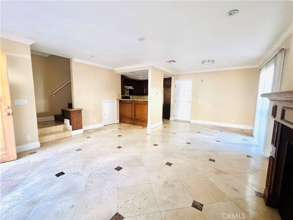 a view of livingroom with furniture and flat screen tv