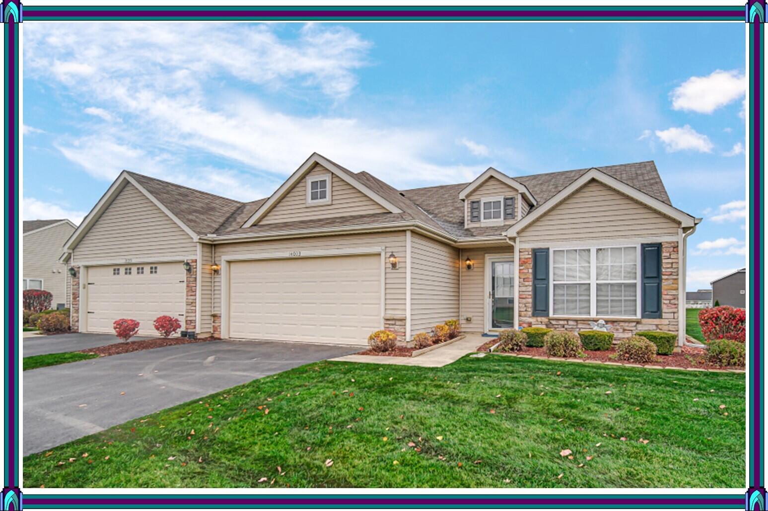 front view of a house with a yard