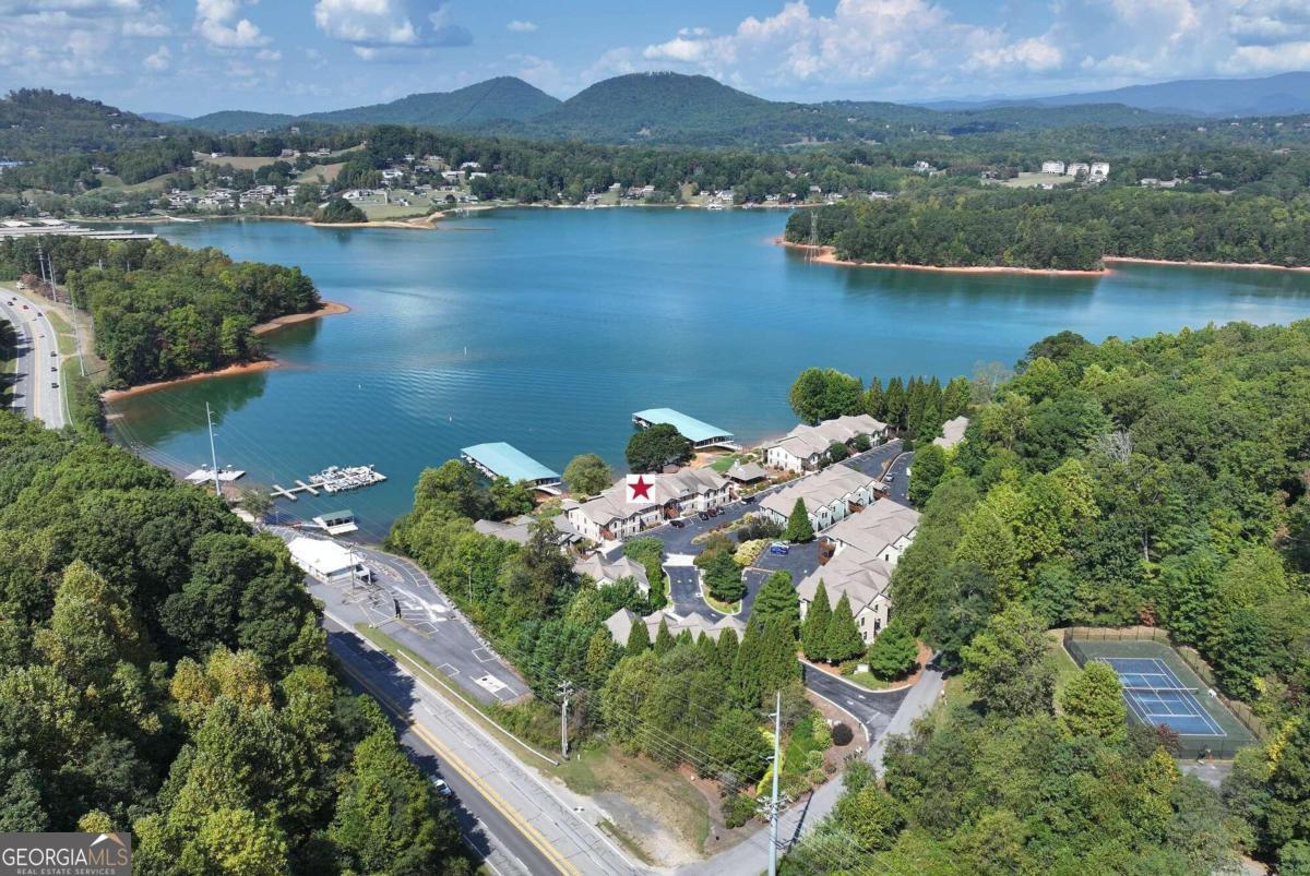 an aerial view of lake residential house with outdoor space