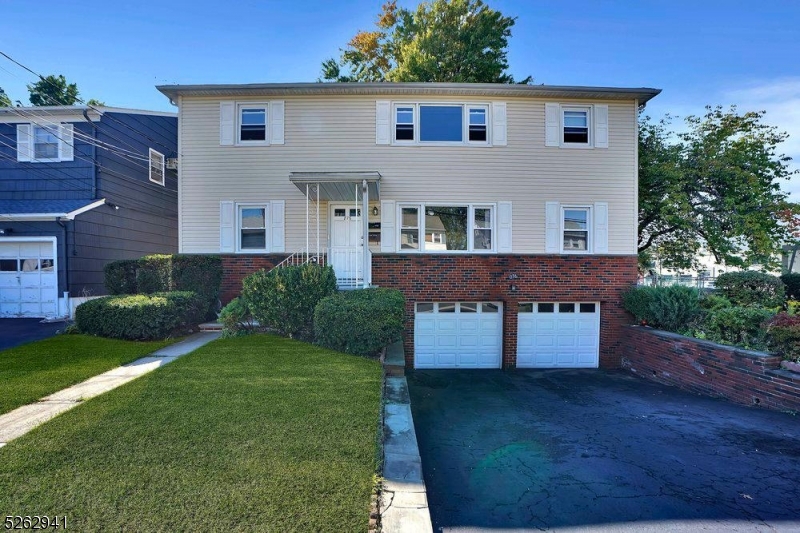 a house view with a garden space