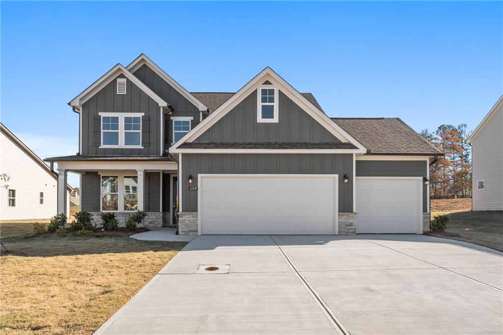 a front view of a house with yard