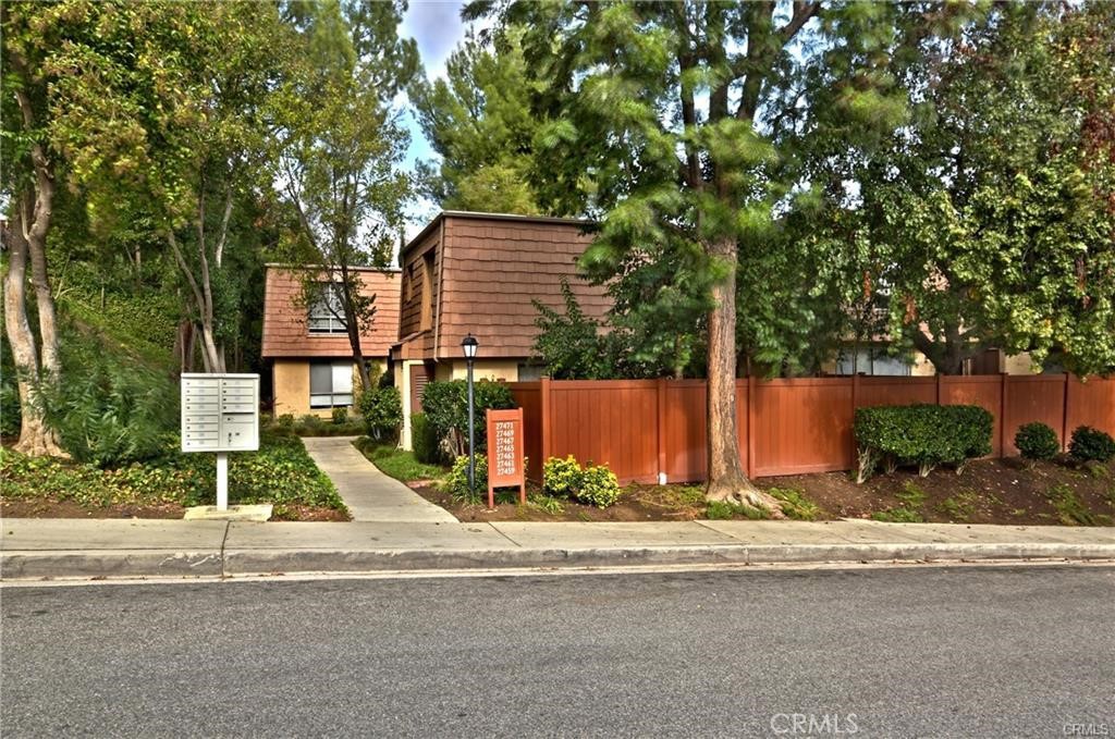 front view of a house with a street