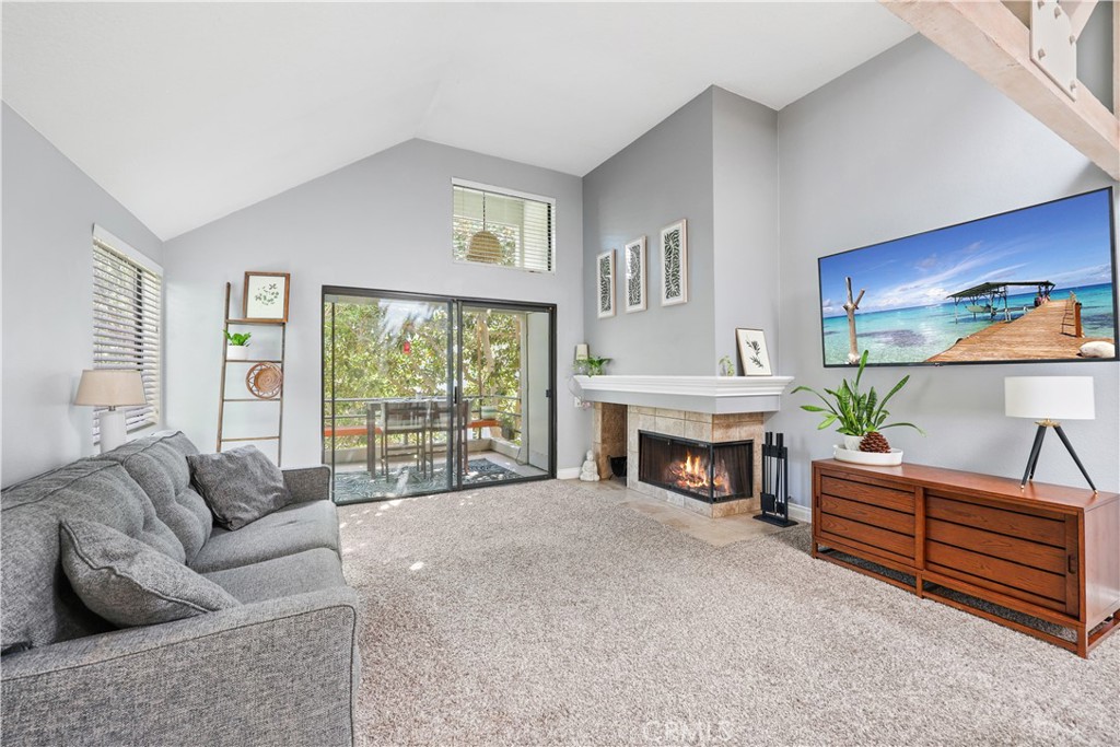 living room toward peaceful private balcony