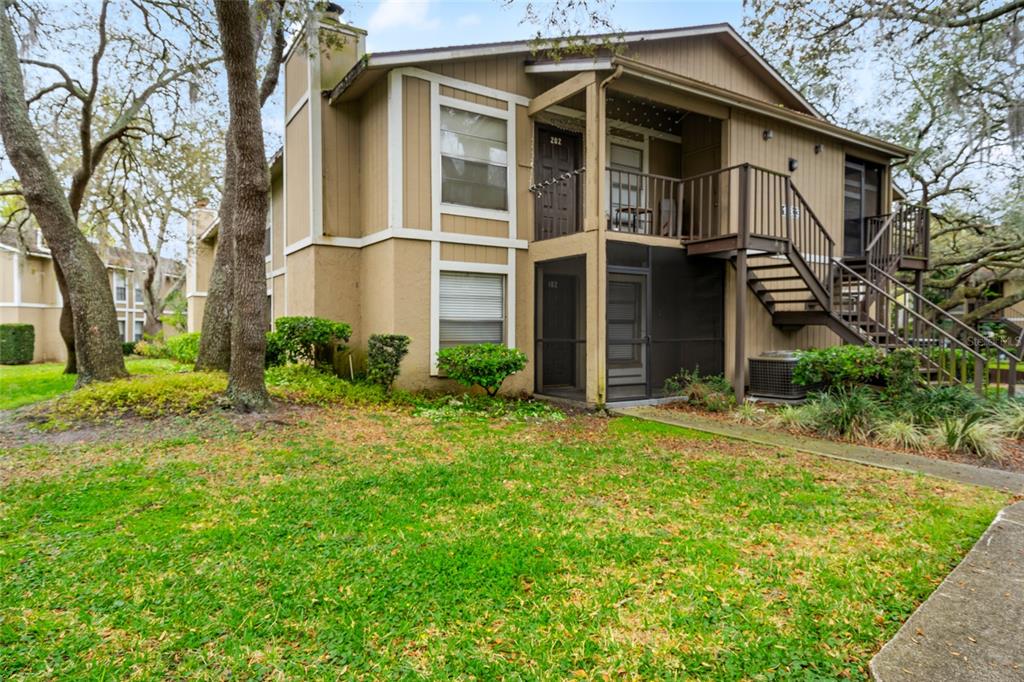 front view of a house with a yard