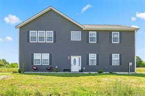 View of front of home with a front yard