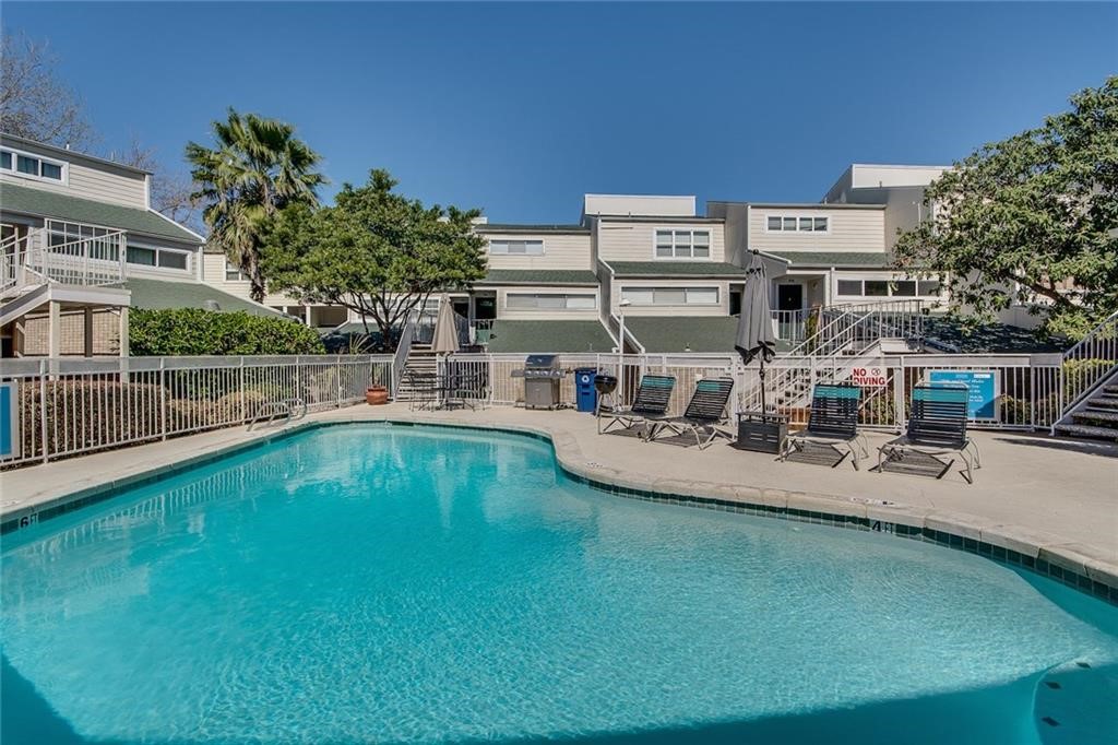 a view of a house with swimming pool