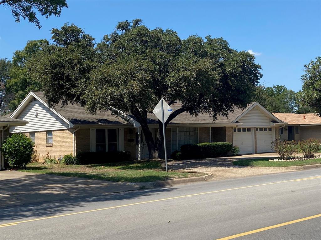 front view of a house with a street