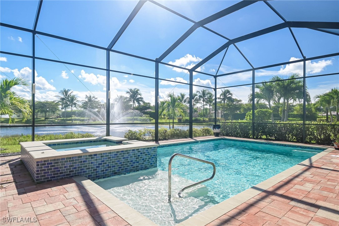 a view of outdoor space with swimming pool and furniture