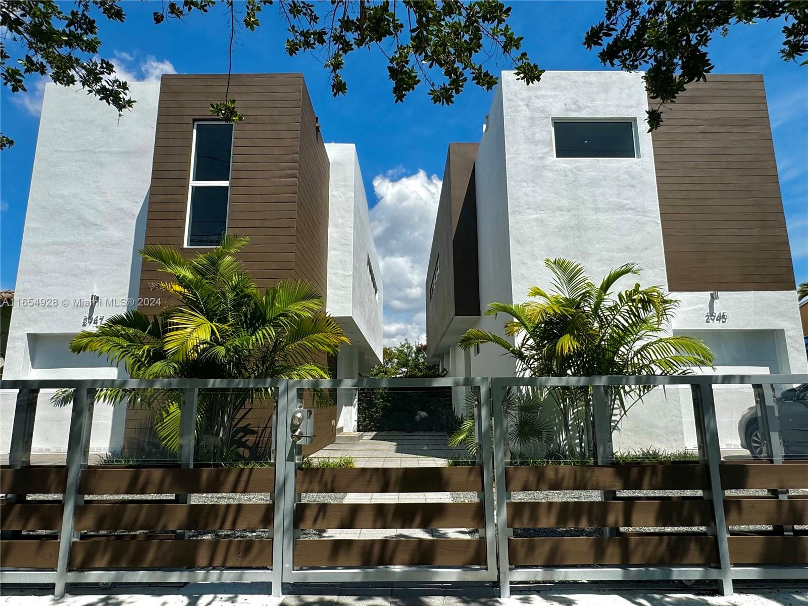 a front view of a house with balcony