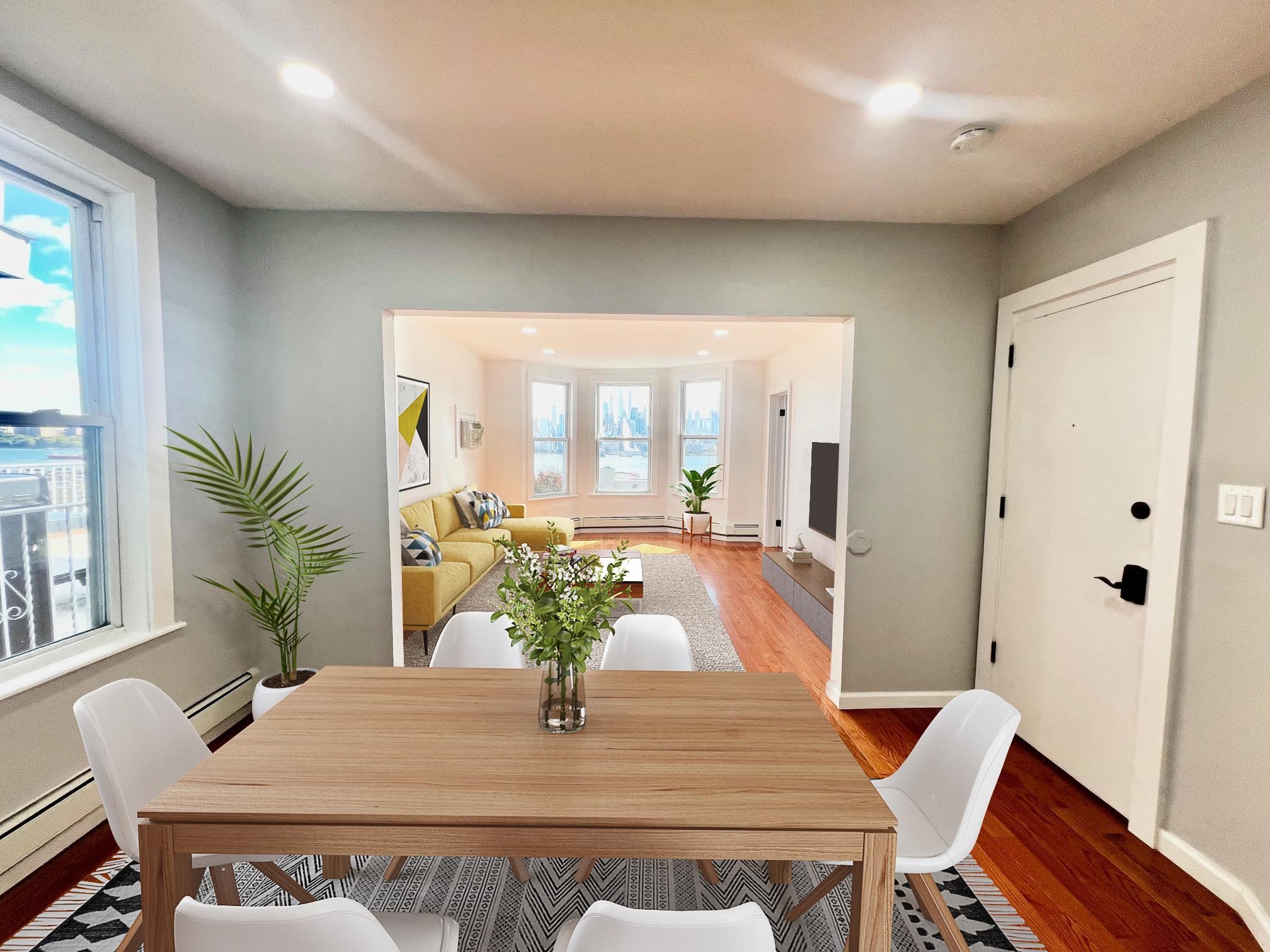 a dining room with furniture and wooden floor