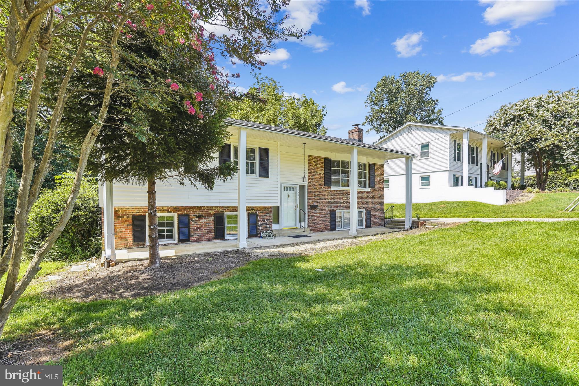 front view of a house with a big yard