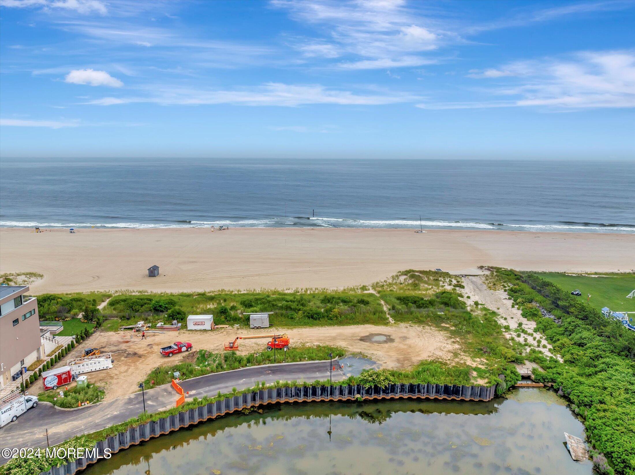 a view of an ocean and city