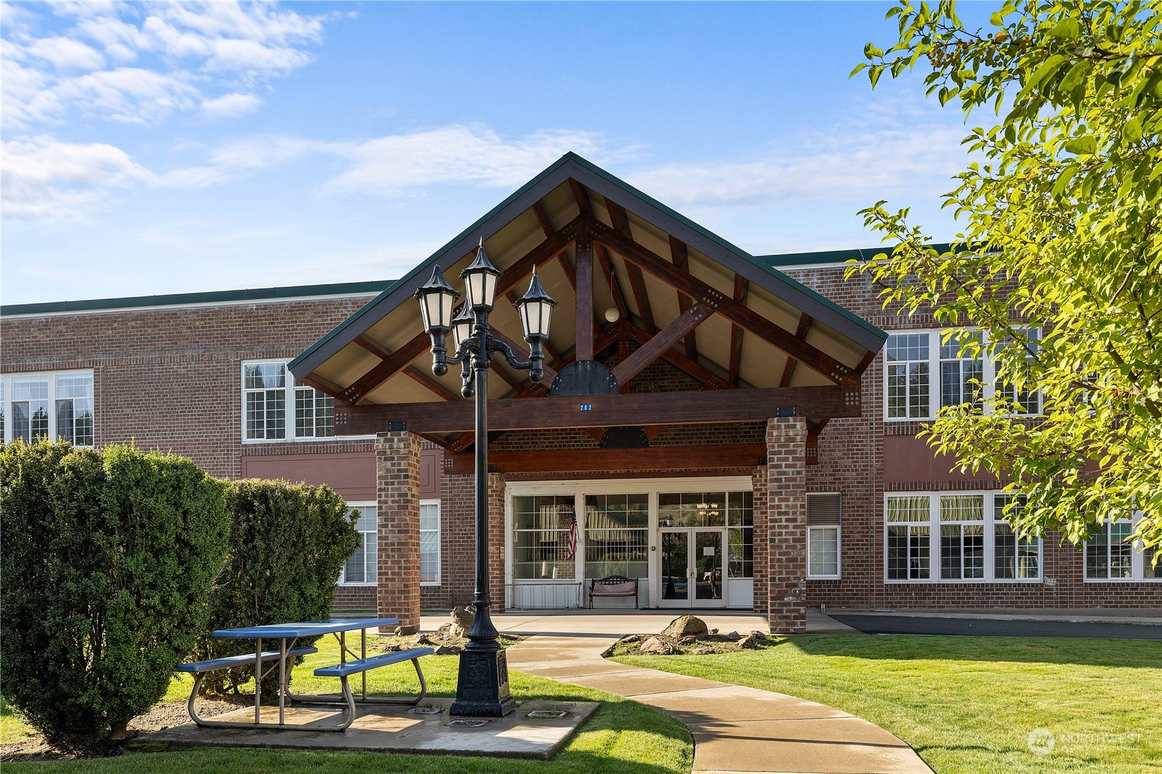 front view of a house with a swimming pool