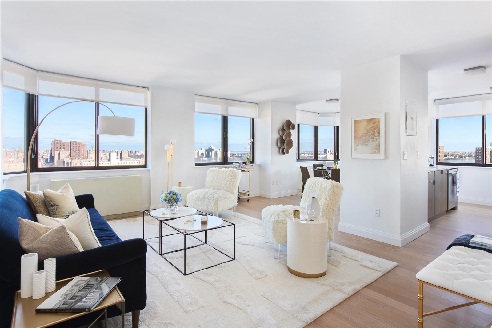 a living room with furniture and a table