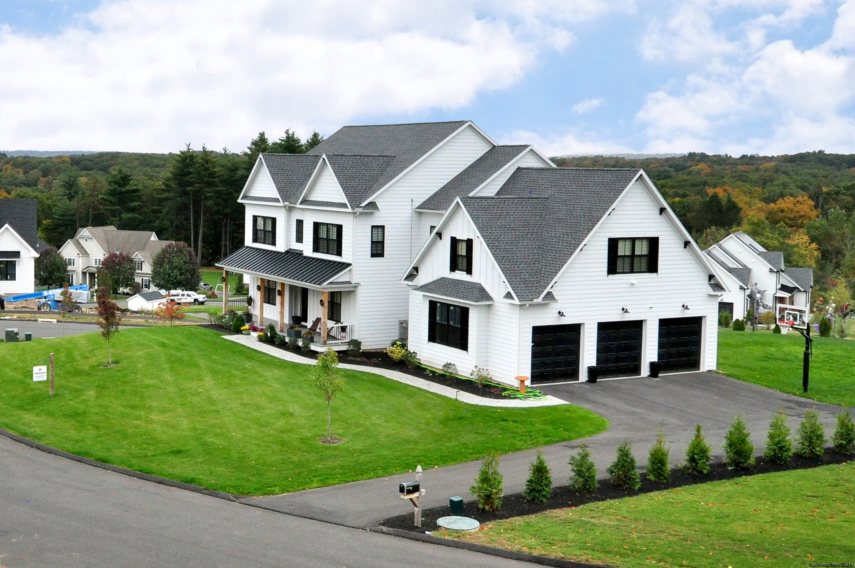 front view of a house with a yard