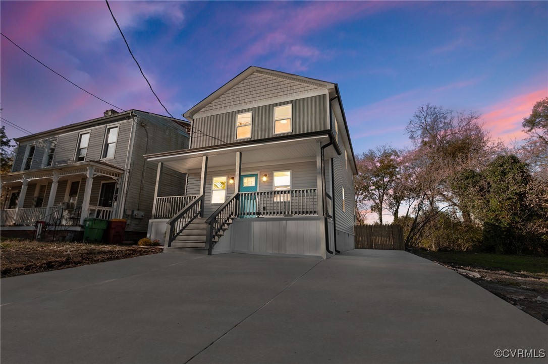 View of front of house with covered porch