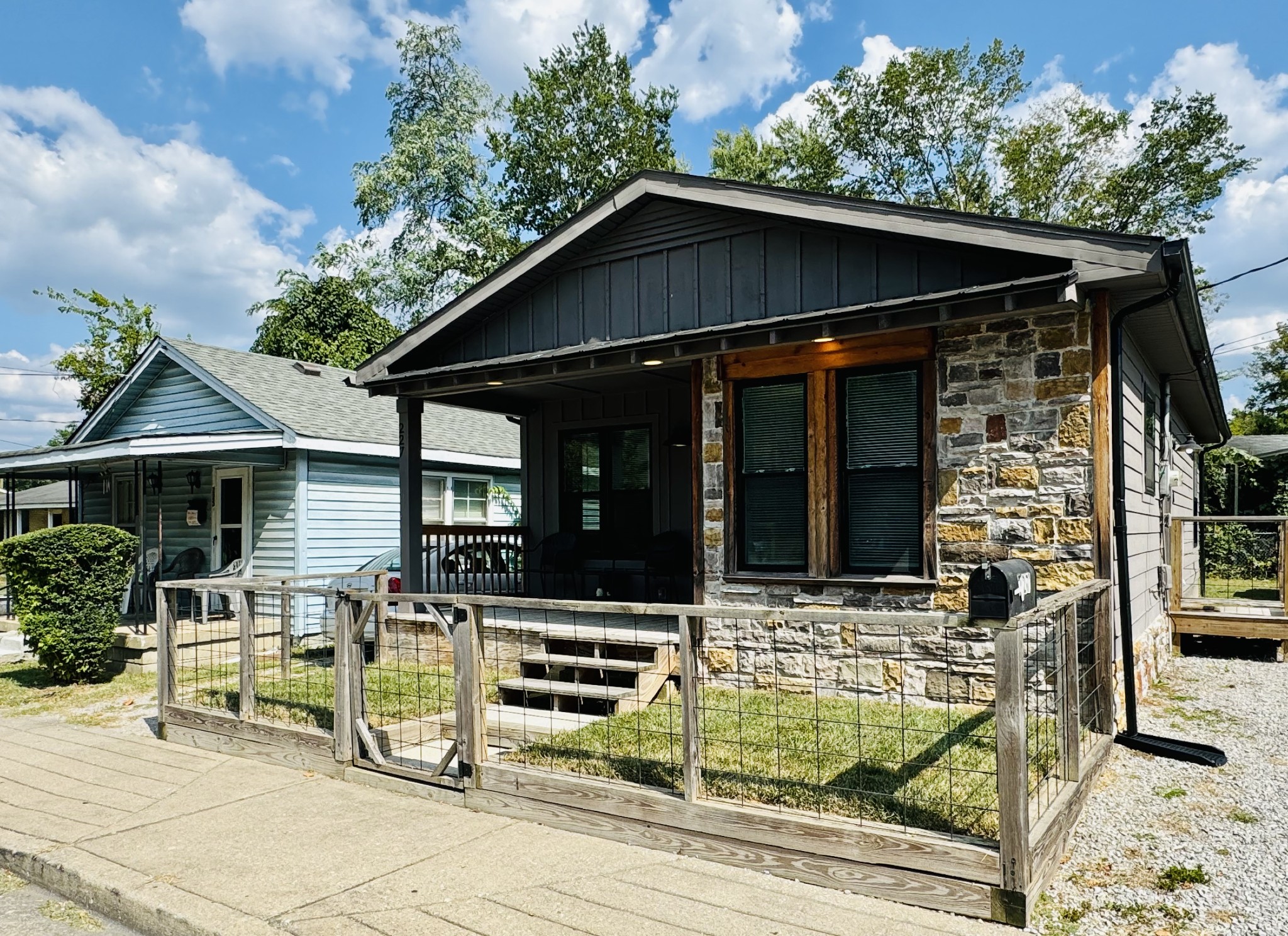 a view of house with backyard space and garden