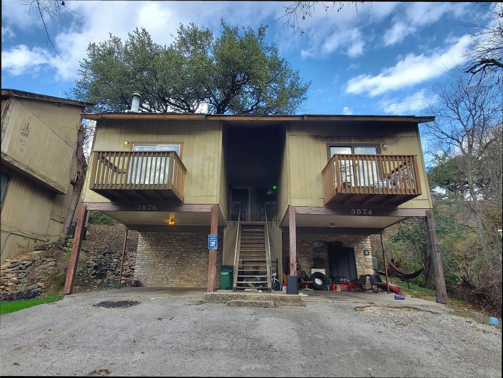 a front view of a house with a garage