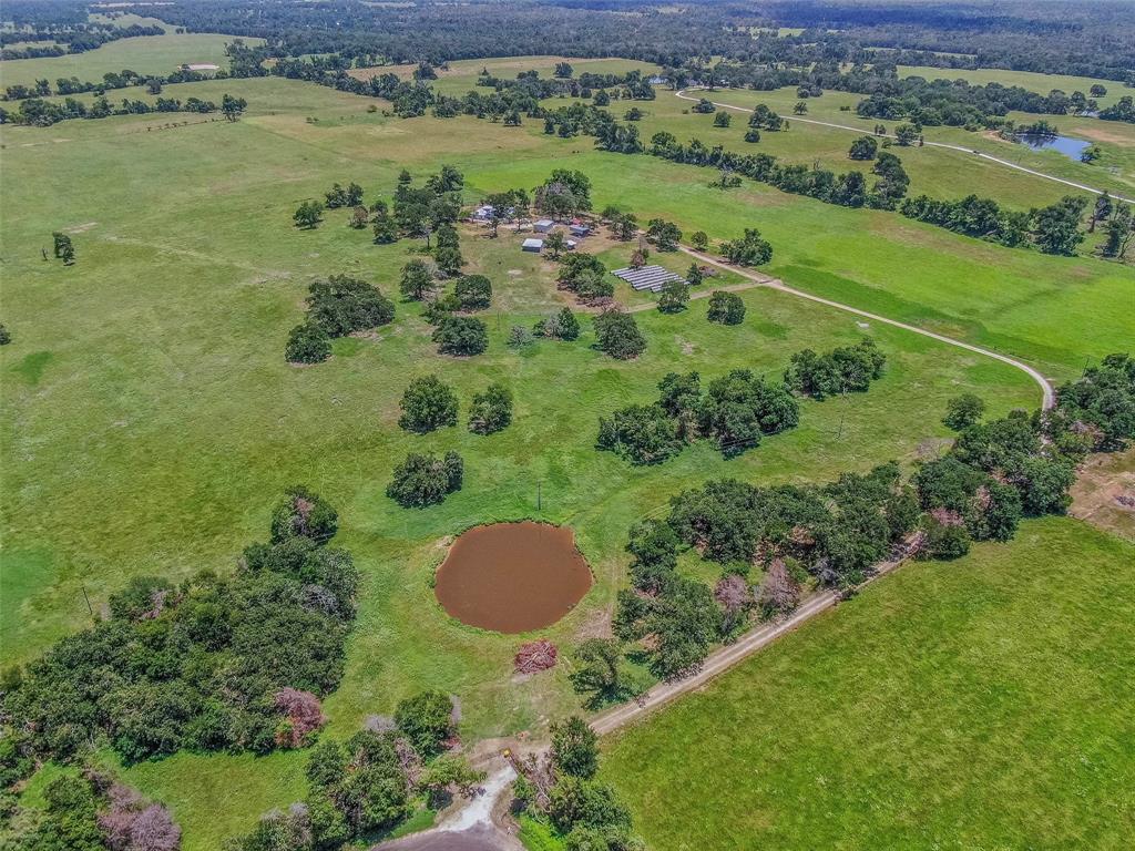 a view of a lake with a yard