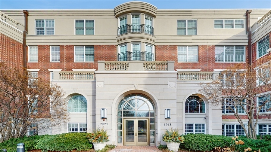 a front view of a building with a balcony