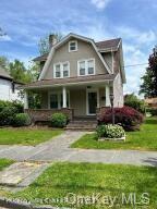 View of front of home featuring covered porch