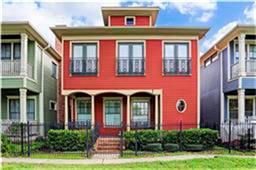 a front view of multi story residential apartment building with yard