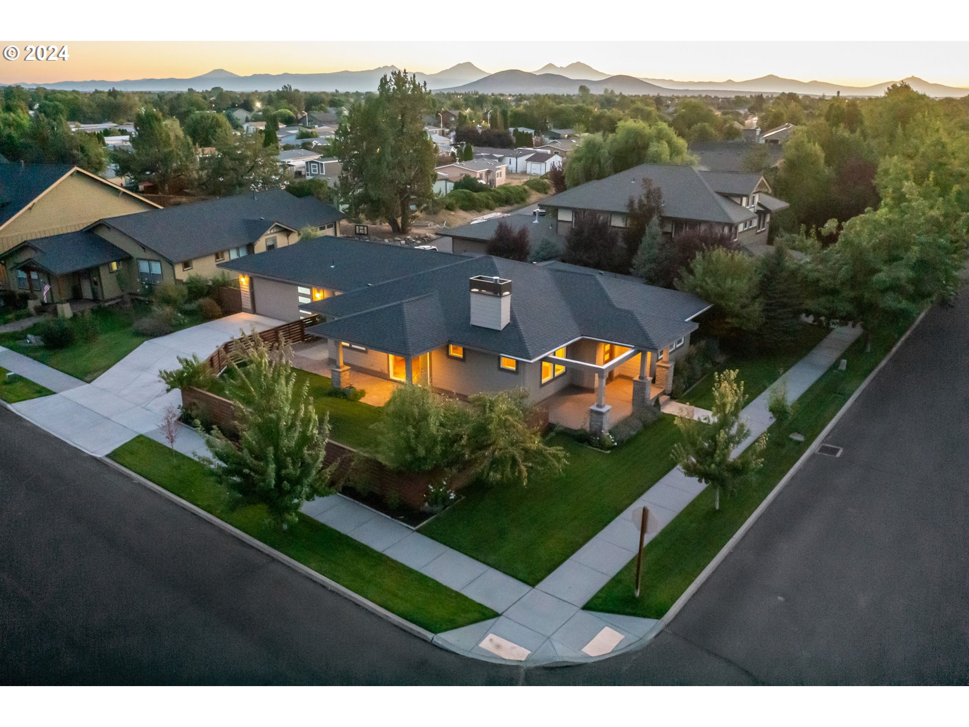 an aerial view of a house with a garden