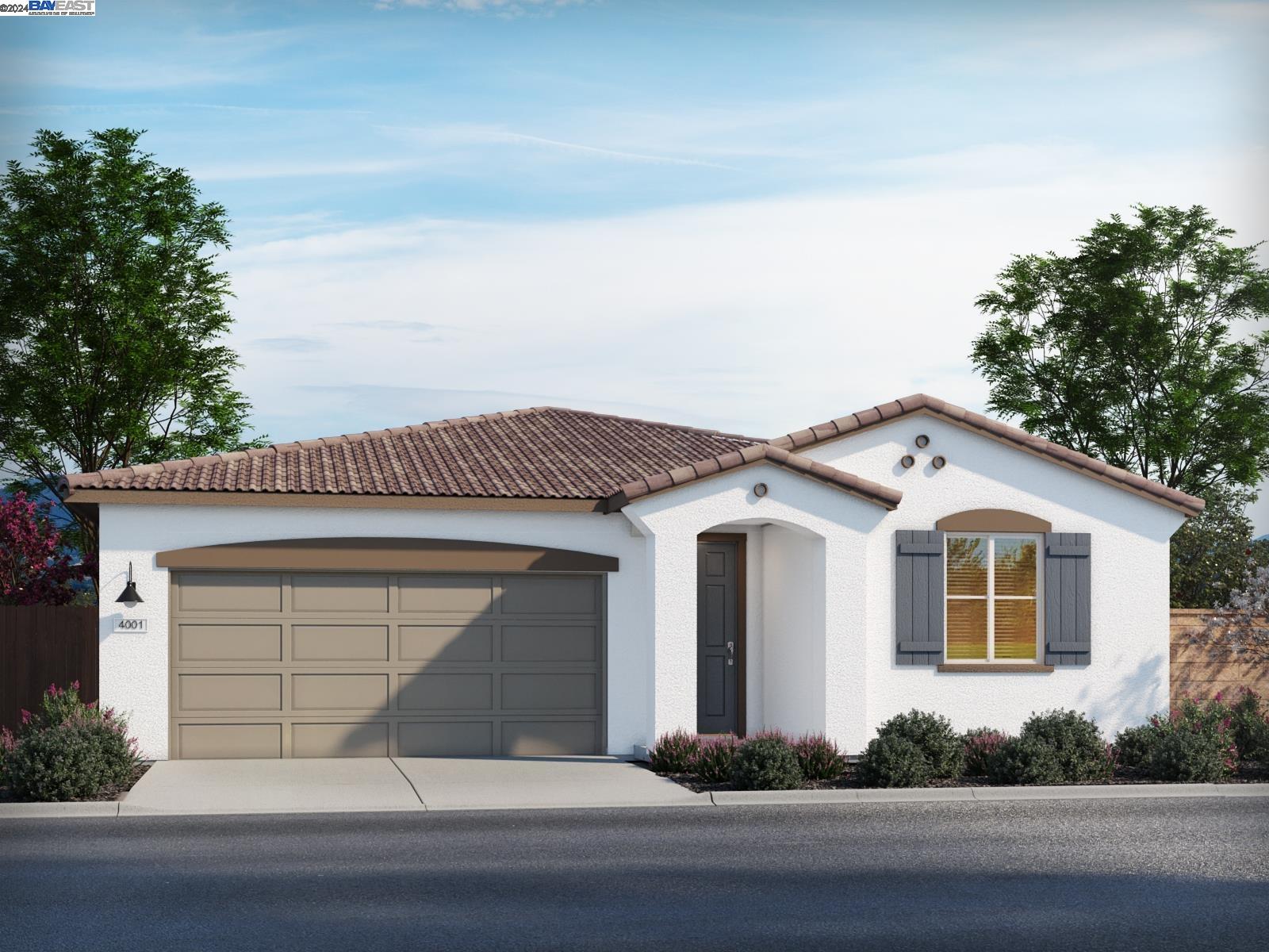 a front view of a house with a garage