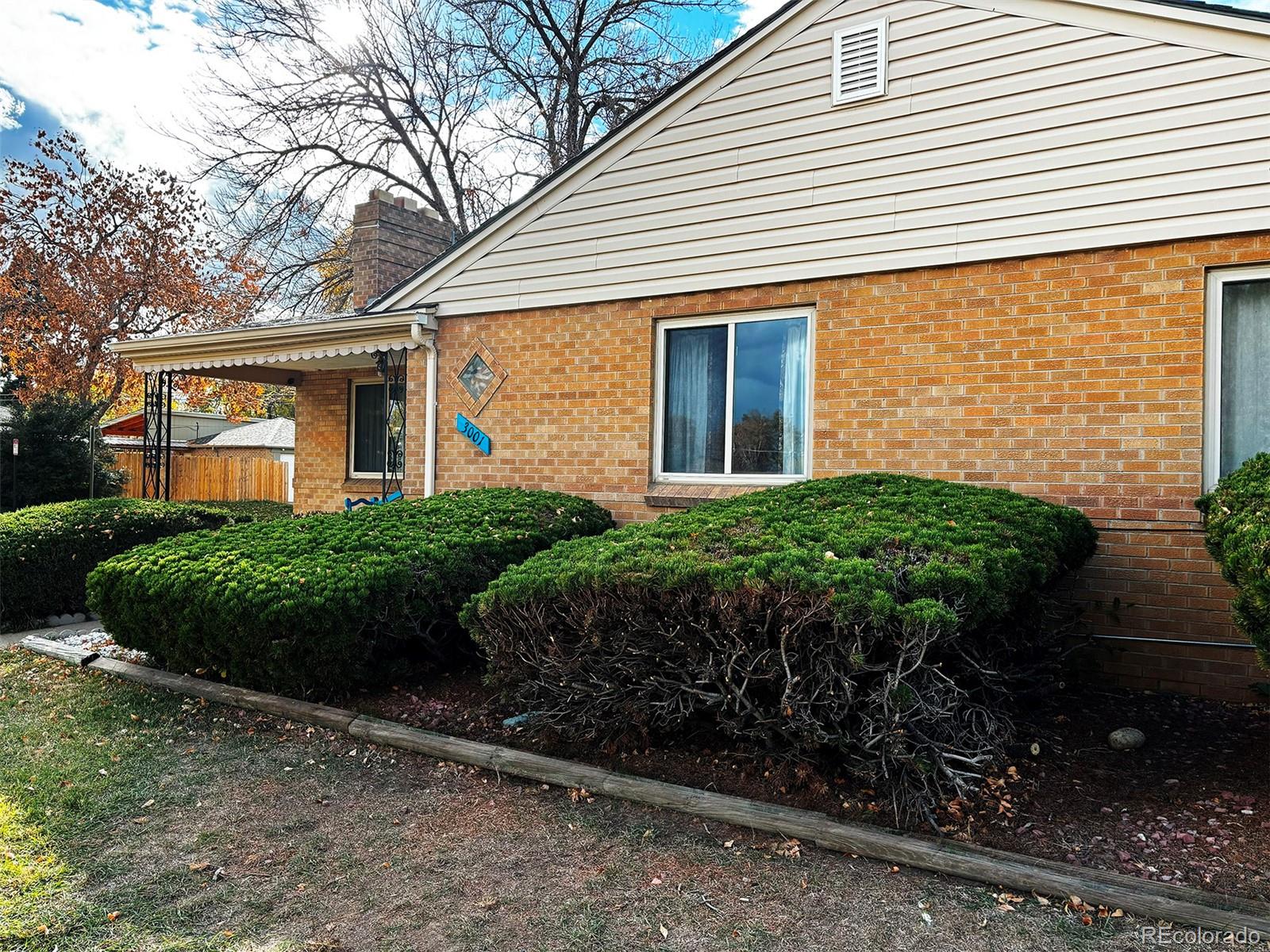 a view of a house with a garden