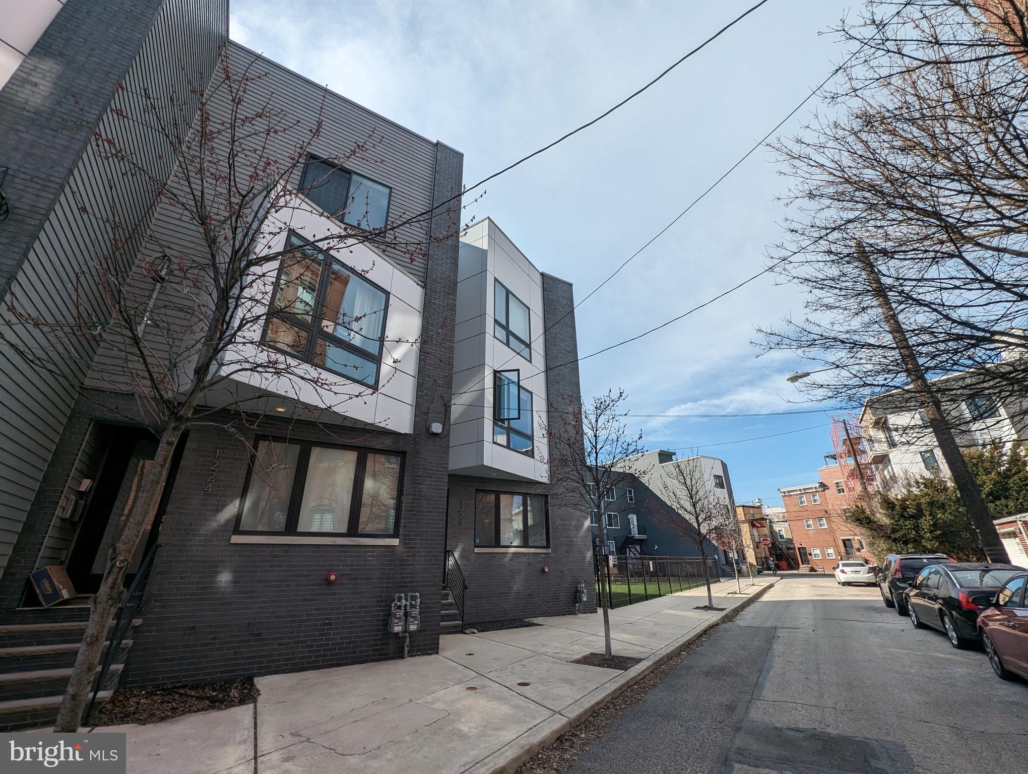 a view of a building with a street