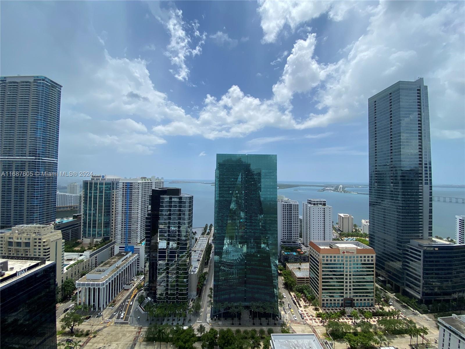 a view of a city with tall buildings